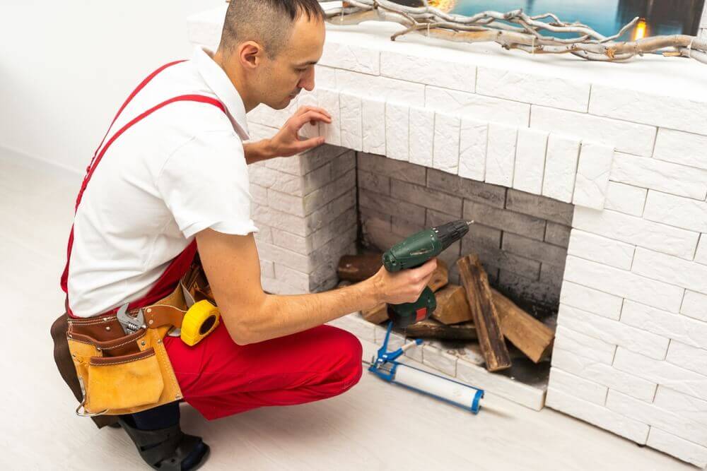 Chimcare technician performing chimney service in Washington